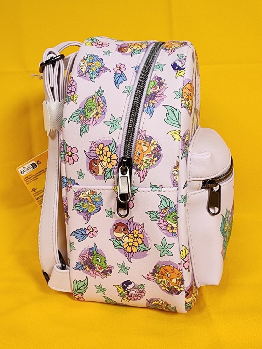 Loungefly The Land Before Time Dinosaurs Floral Purple Soft Tag Mini Backpack - Picture 4 of 11